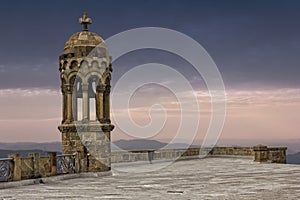 Bell tower on top of Tibidabo mountain photo
