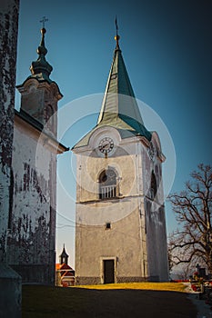 Bell tower of Zasavska sveta gora, on a sunny winter day. Beautiful religious chuch on the top of the hill in the centre of