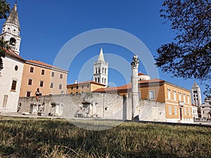 Bell towers of Ilya church, Anastasia cathedral, holy Mary church, roman column and dome of Donat church in town Zadar