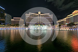 Bellagio hotel and casino and Bellagio fountain show at night in Las Vegas strip