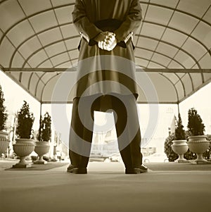 Bellboy waiting for a client in an hotel entrance