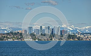 Bellevue, Washington and Cascade Mountains across Lake Washington photo