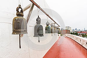 Bells and path in Buddhist Temple photo