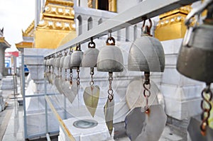 Bells of reincarnation or Samsara in a pagoda in Thailand photo