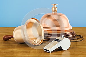 Bells and whistles concept on the wooden table. 3D rendering