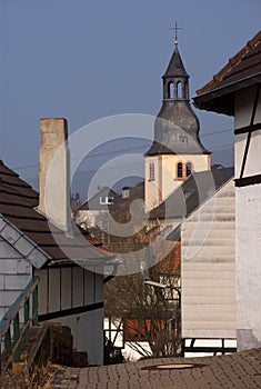 Belltower in old German town photo