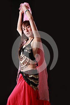 Belly dancer on black background