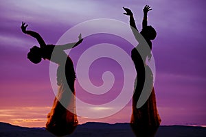 Belly dancer purple silhouette two photo