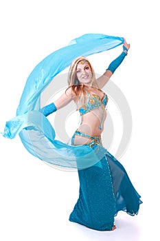 Belly dancer turning with veil