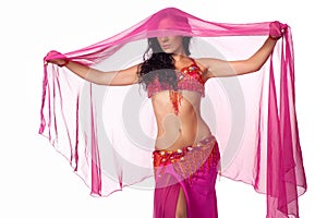 Belly dancer wrapped in a hot pink veil