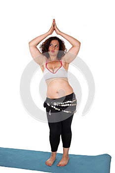 Belly dancing young woman.