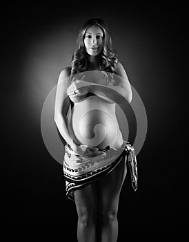 Belly of pregnant woman monochrome