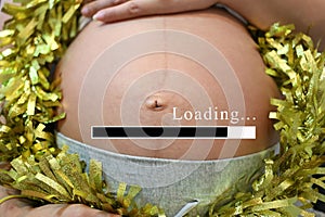 Belly of pregnant women and loading text in concept of time in c