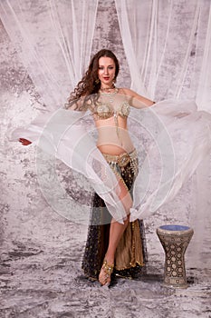 Bellydancer with curtains and drum