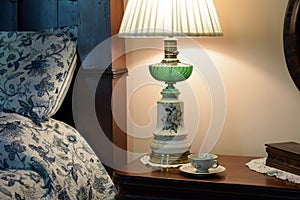 Belmont antebellum plantation bedside detail oil lamp and teacup