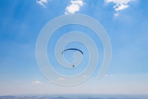 Belo Horizonte, Minas Gerais, Brazil. Paraglider flying from top