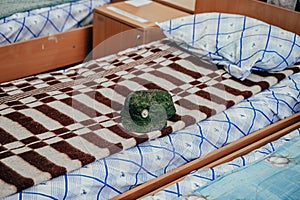 The belongings of mobilized Russian soldiers in the training center. A soldier's cap.