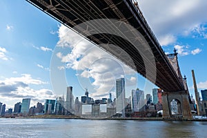 Below the Queensboro Bridge along the East River with the Midtown Manhattan Skyline in New York City