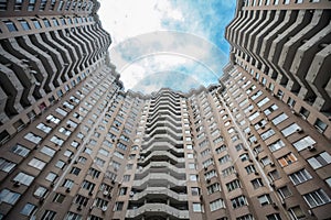 Below view on the ukrainian skyscrappers. Odesa Chudo Gorod. Living high-rise building. Modern condominium on sky background photo