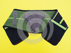 Belt with orthotic compression supports and lumbar pad