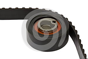 Belt and tensioner roller close-up, isolated on white background