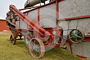 Side profile of an old threshing machine