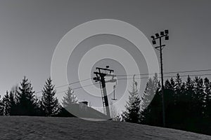 Belveder hill over Zelezna Ruda town with ski slope and ski lift