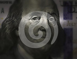 Ben Franklin's face on a bill of U.S. $ 100