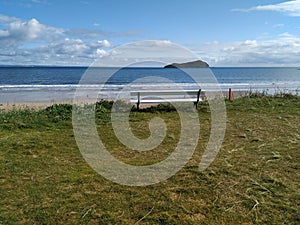 A bench on the beach in North Berwick in Scotland