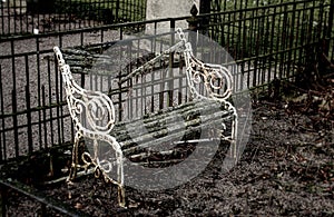 An old and forgotten bench in a cemetery of MalmÃÂ¶, Sweden.