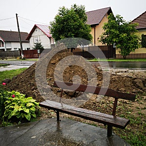 Bench and dirt pile