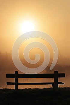 Bench on a foggy morning