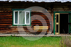 Bench in front of log home decorative style hostel