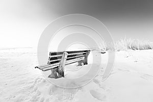 Bench with ice lake chiemsee