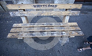 Bench with the inscription, as the memory of apartheid and segregation in South Africa