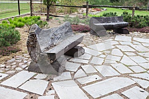 Bench from natural wood in summer park