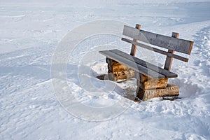 Bench next to a hiking trail