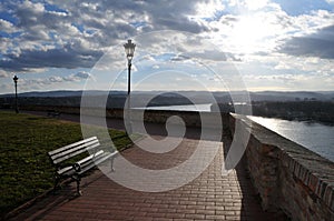 The bench next to the wall with unreachable views of the Danube and Novi Sad from the Petrovaradin Fortress