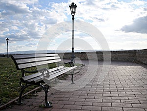 The bench next to the wall with unreachable views of the Danube and Novi Sad from the Petrovaradin Fortress