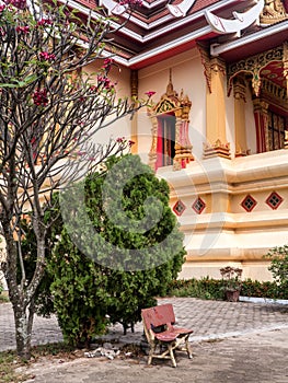 Bench outside Wat Thatluang Neua, Vientiane photo