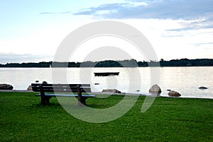 Bench overlooking river or sea