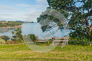 A bench overlooking the sea, Whangaparaoa, Auckland, New Zealand