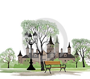 Bench in park with old castle behind