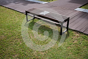 Bench at the park with social distancing sticker on top