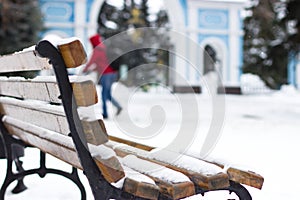 Bench in the park in winter.