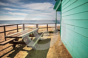 Bench and picnic table at Crystal Cove State Park beach