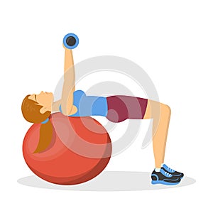 Bench press on fitness ball, exercise for chest. Woman