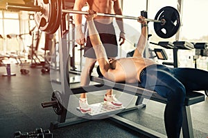 Bench pressing in a gym