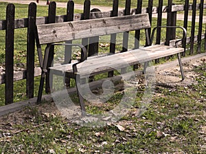 Bench in a public park in autumn