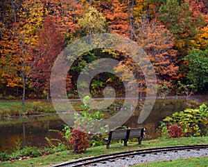 Bench and Railroad Track in Steele Creek Park photo